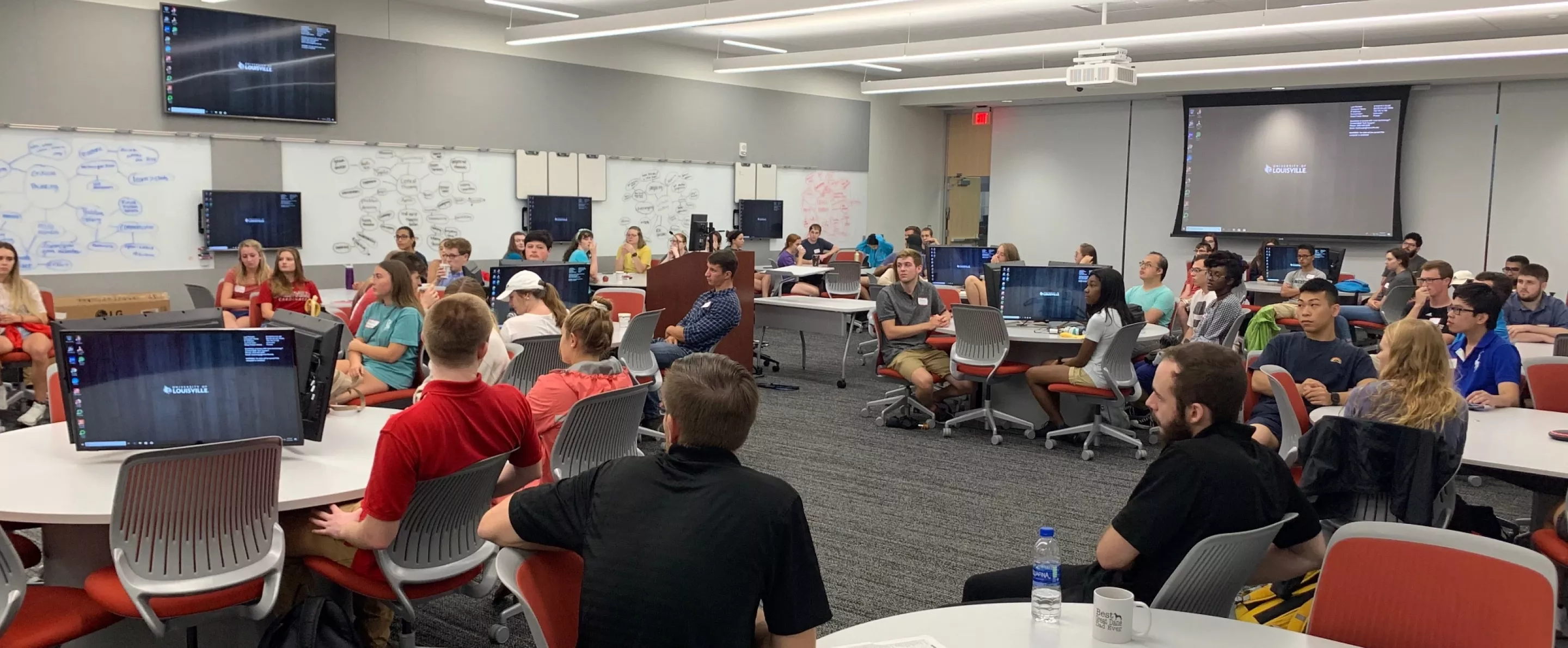 Students attending a workshop at REACH