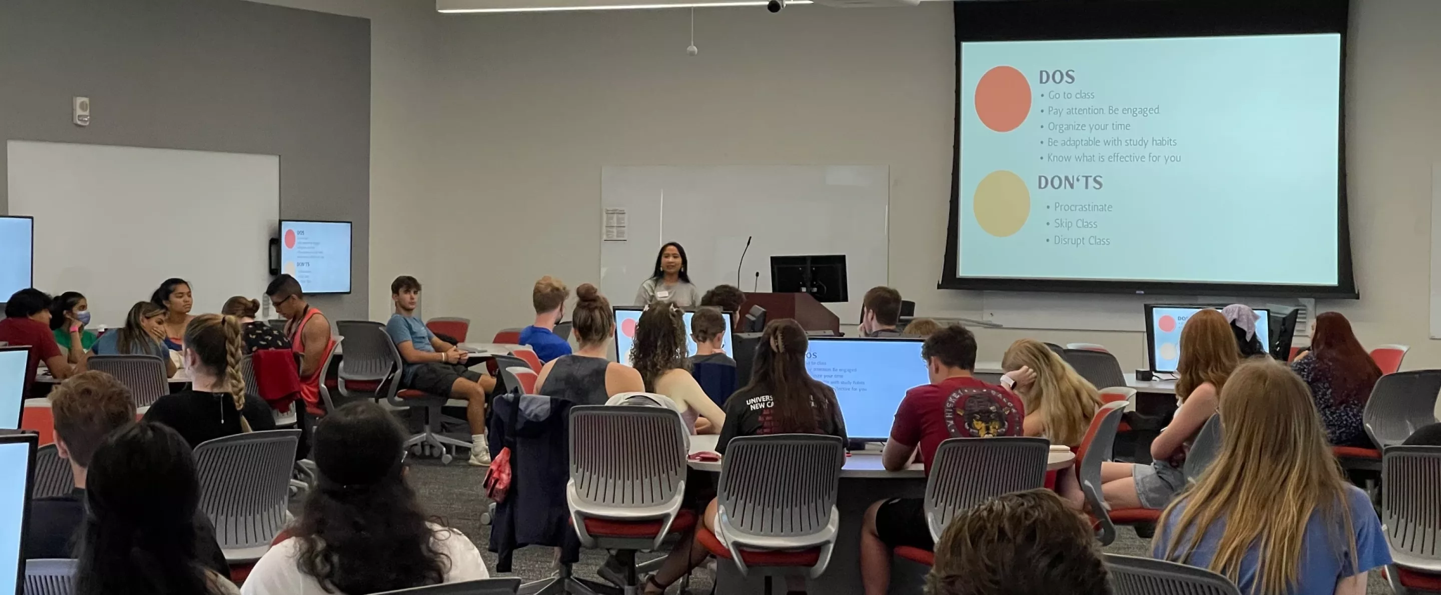 Students attending a workshop at REACH