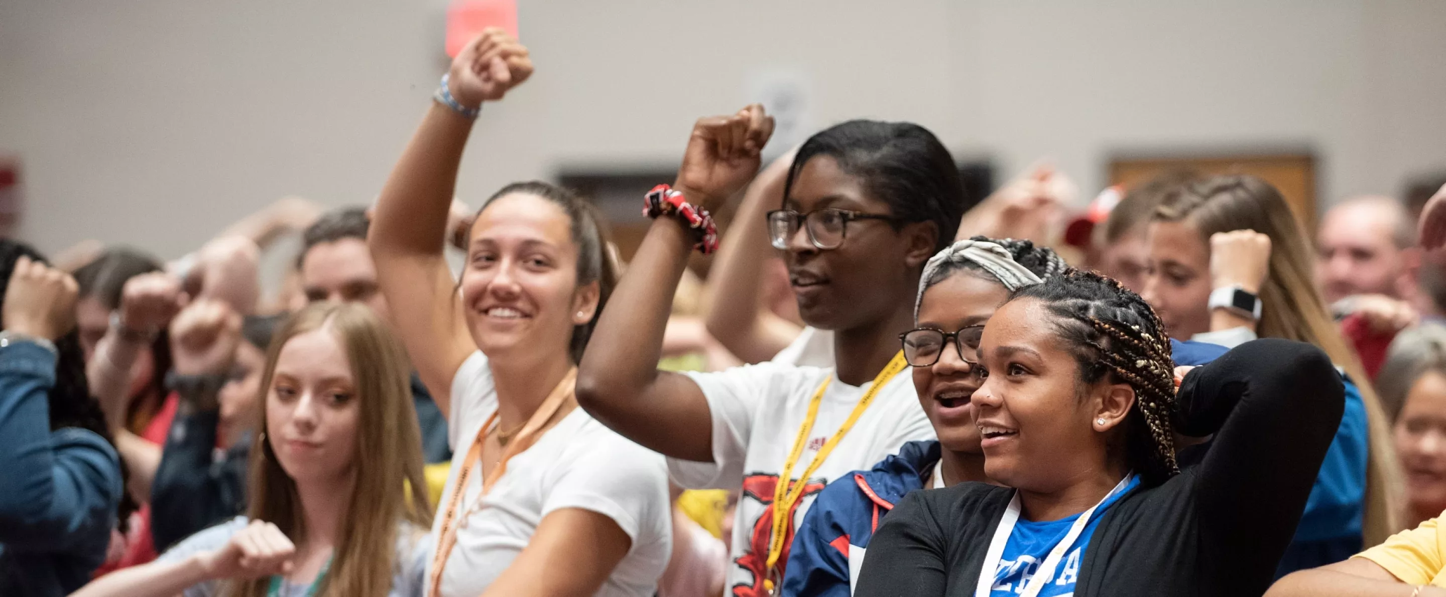First year students at a Welcome Week event performing the CARDS cheer