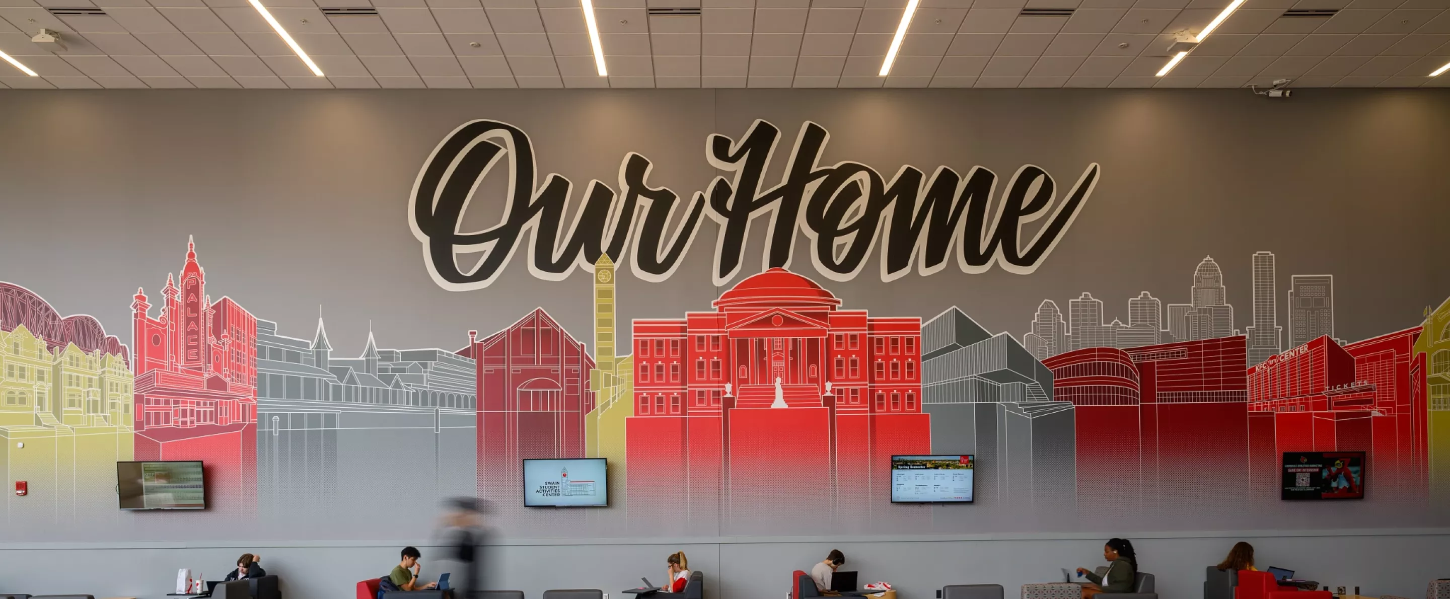 Interior Student Activity Center with Our Home Mural.