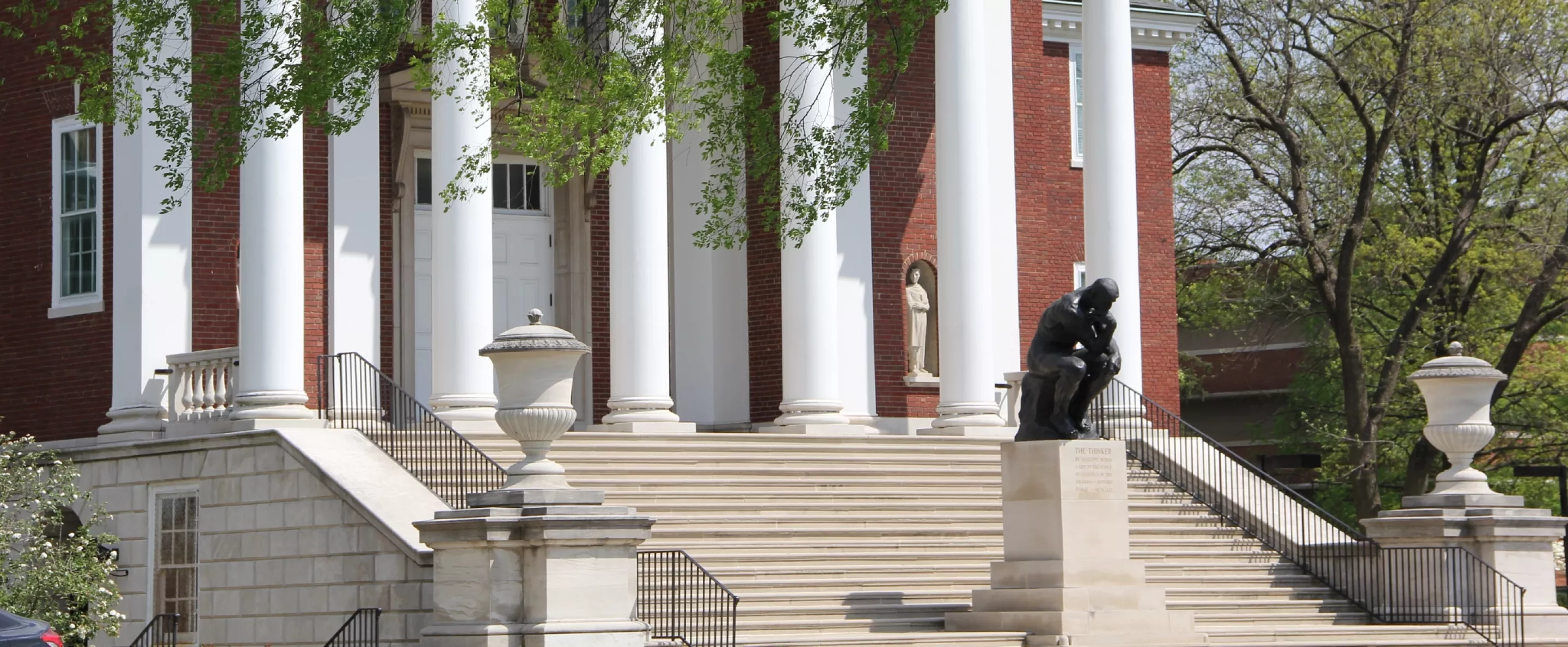 Steps to Grawemeyer Hall with the Thinker