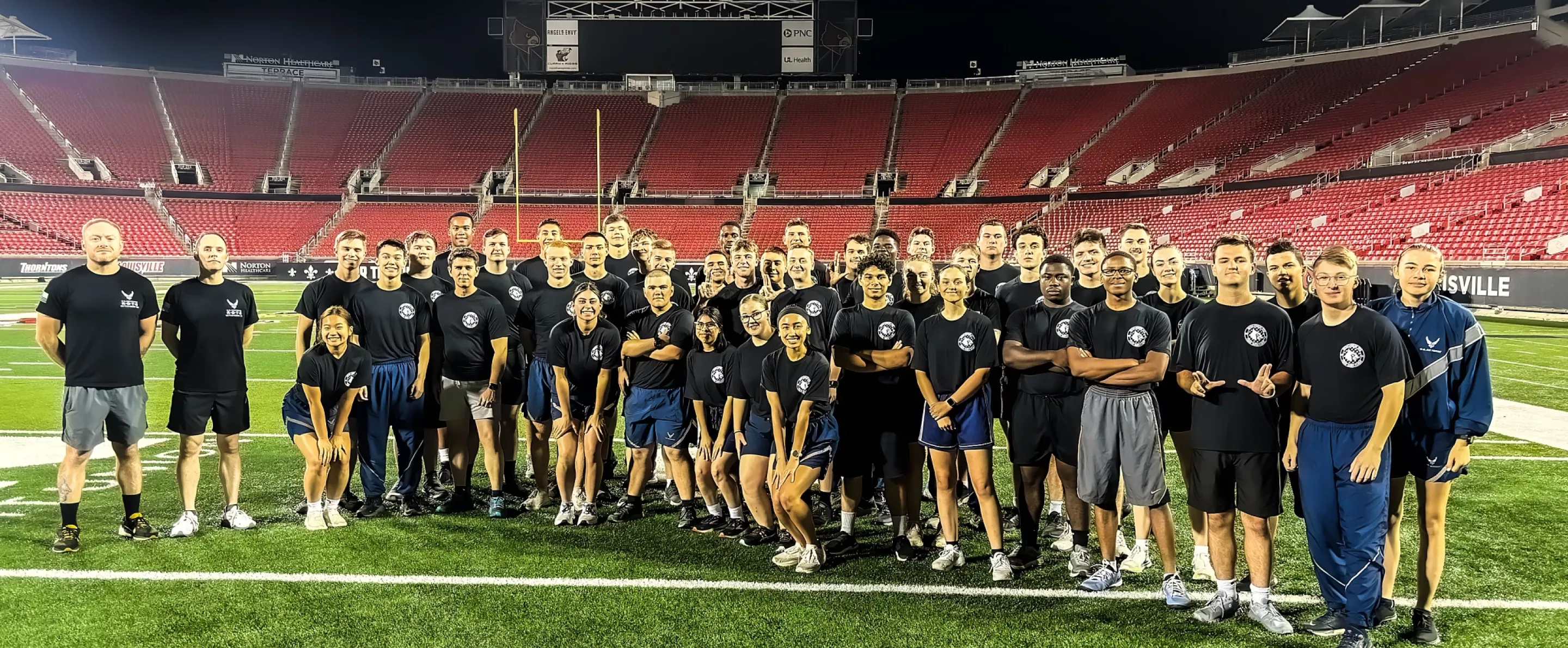 AFROTC Cadets pose together in the UofL Stadium