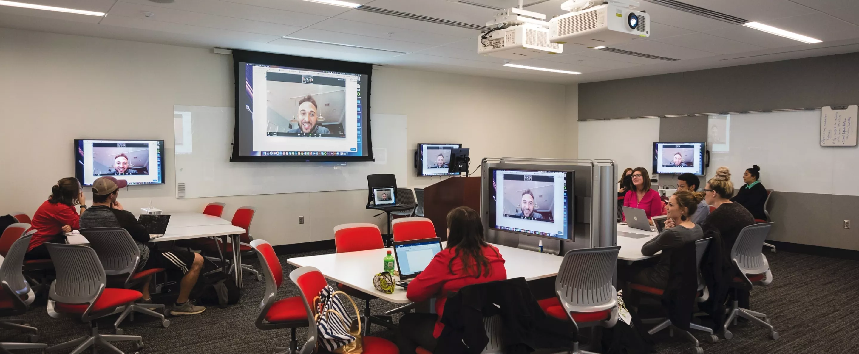 Students using video conferencing in a classroom