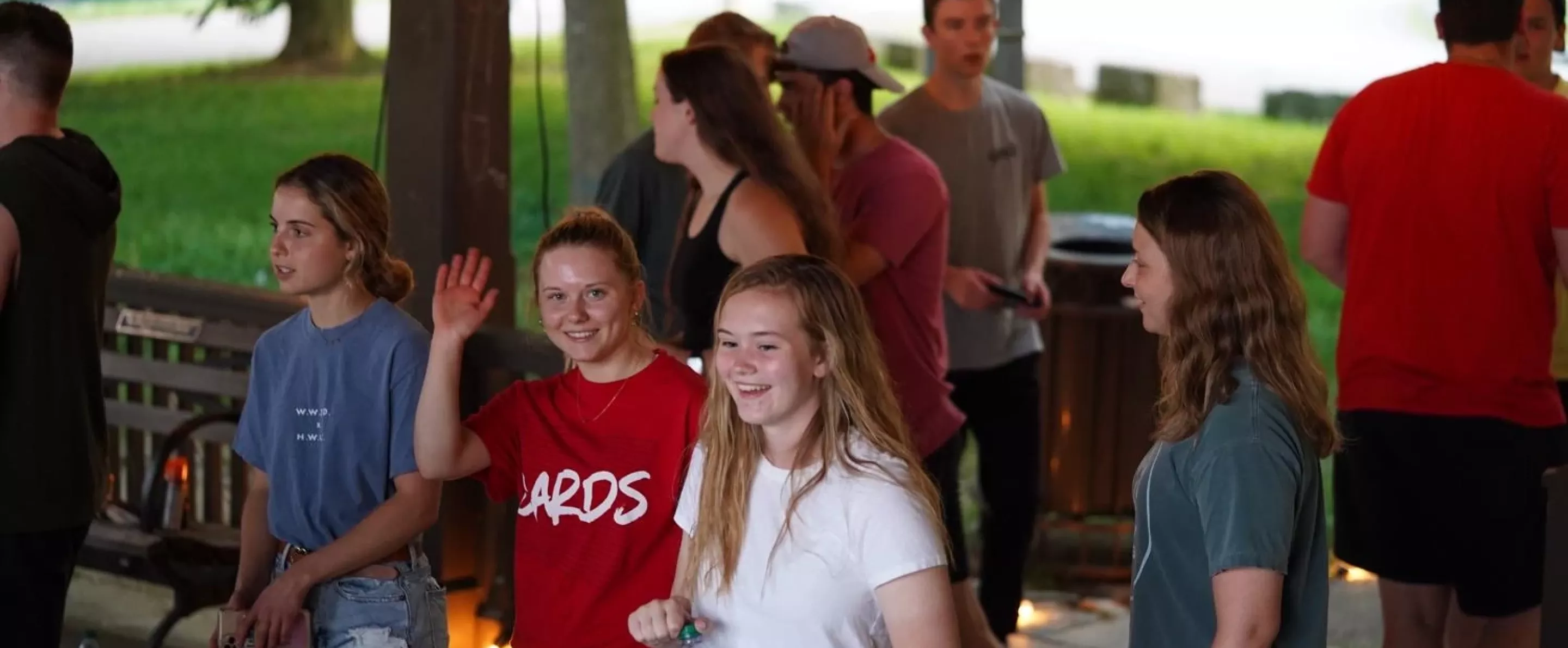 Students waving at summer Ignite faith event
