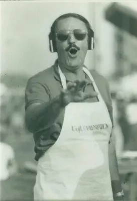 Harold Adams wearing an apron
