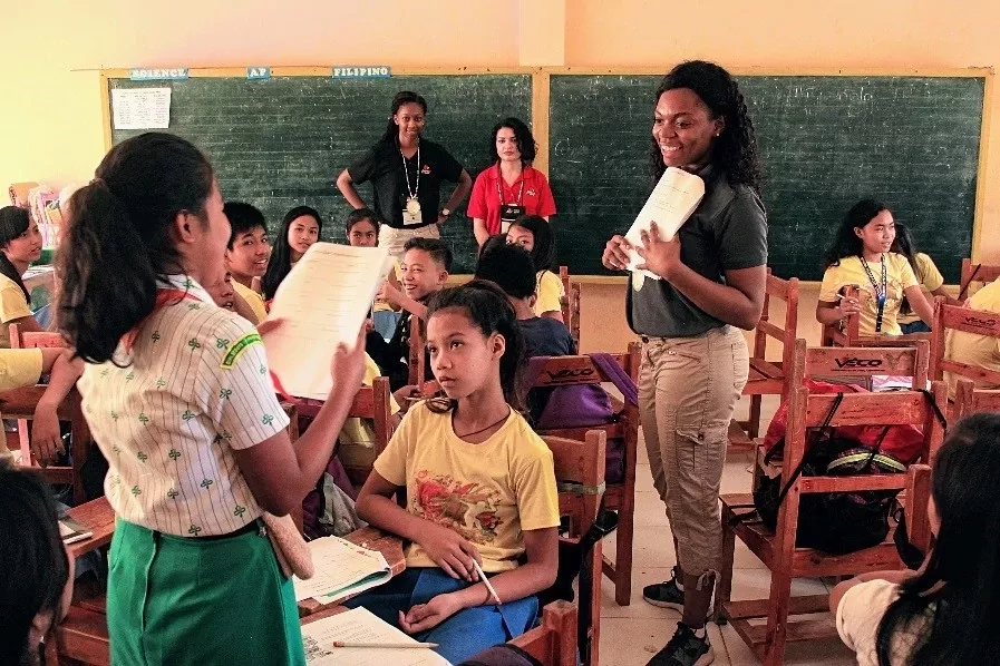 International Service Learning Program student leading a class in the phillipines