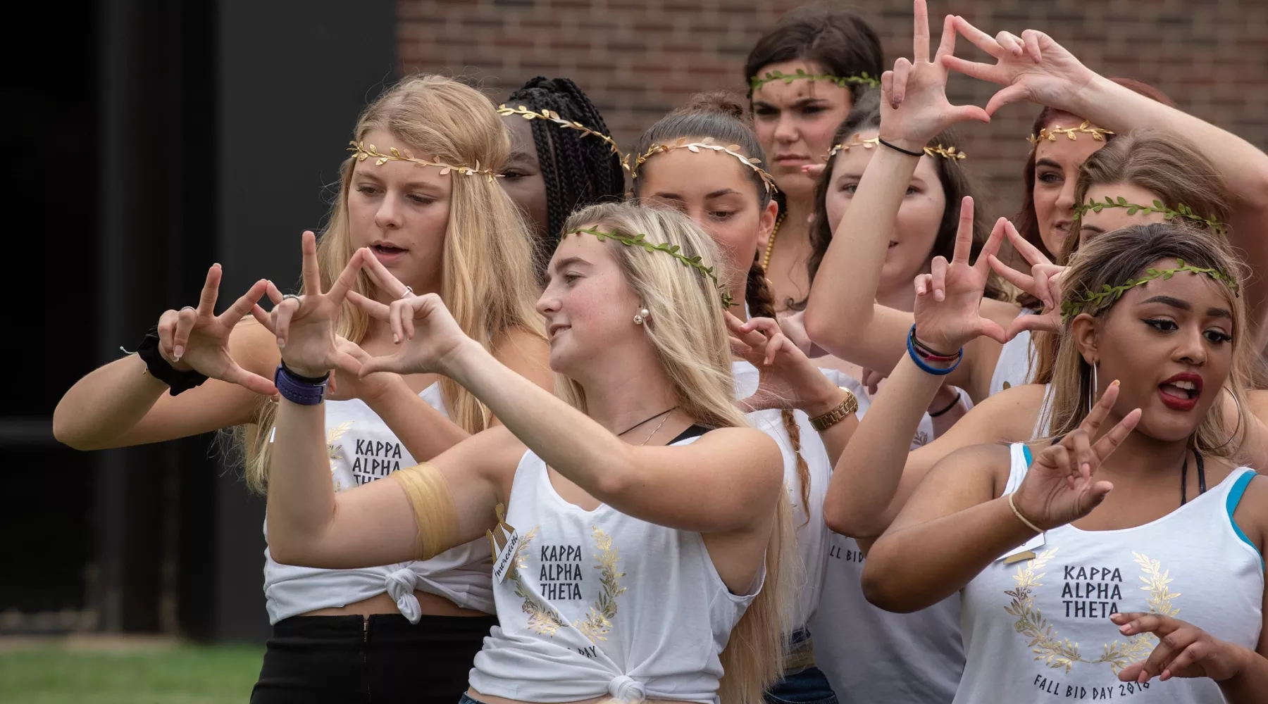 A group of sorority pledges performing at Bid Day
