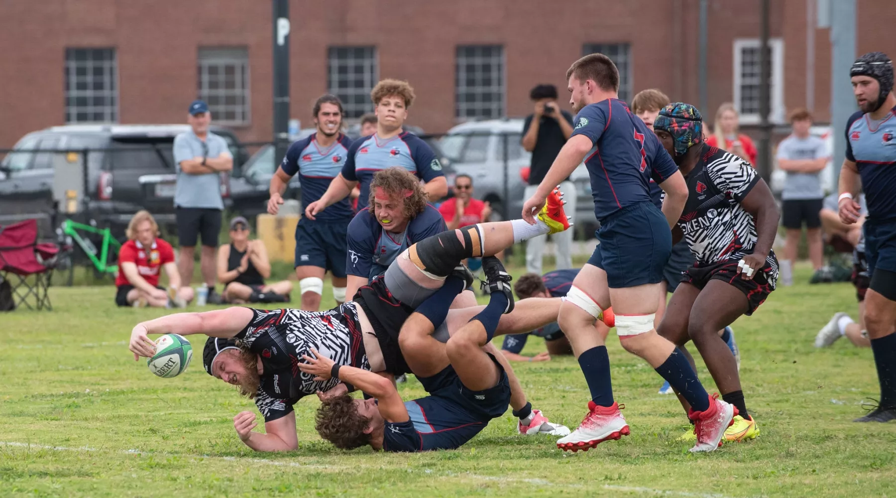 A group of student rugby players in competition