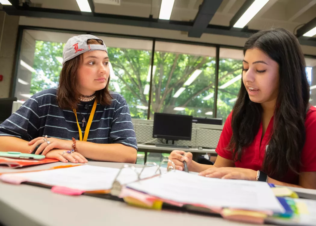 Student with an academic advisor during Orientation