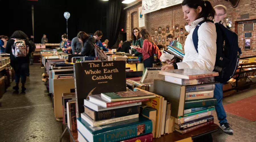 Students browse books at the Honors Book Sale