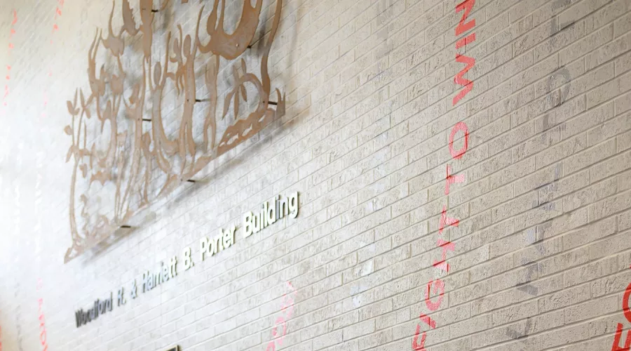 Student working in the Woodford R. and Harriet Porter Building.